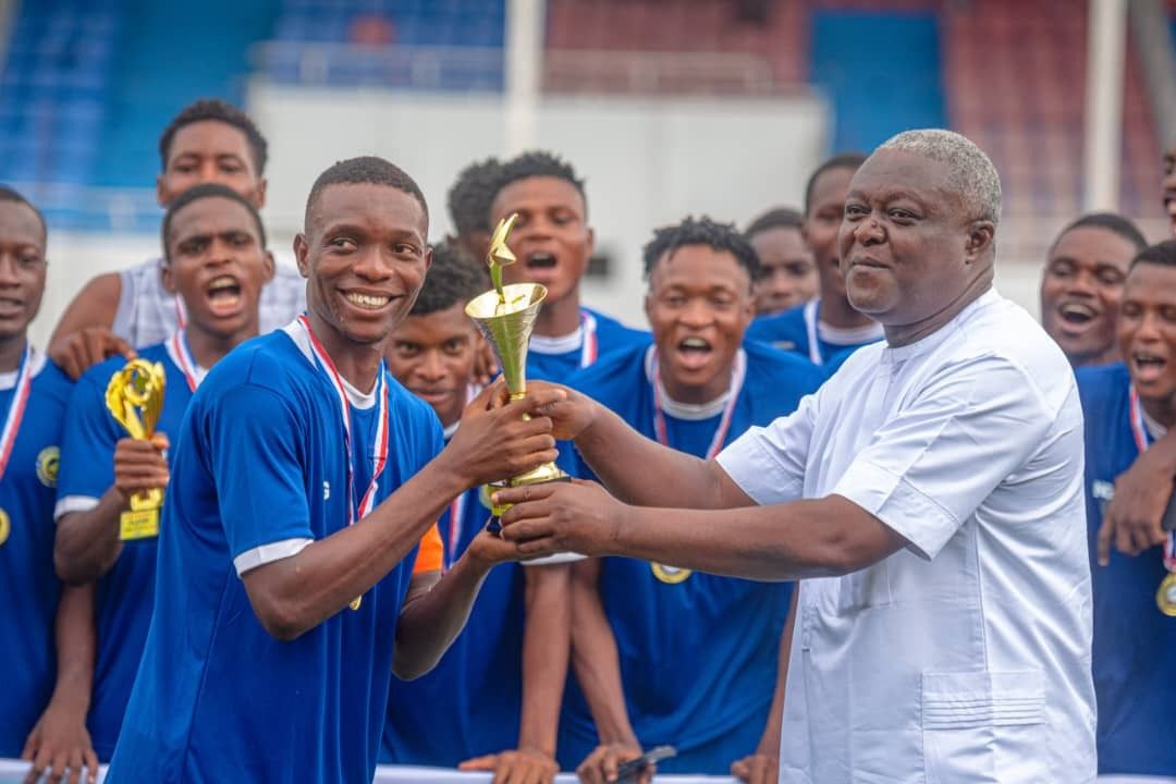 The inaugural trophy is presented