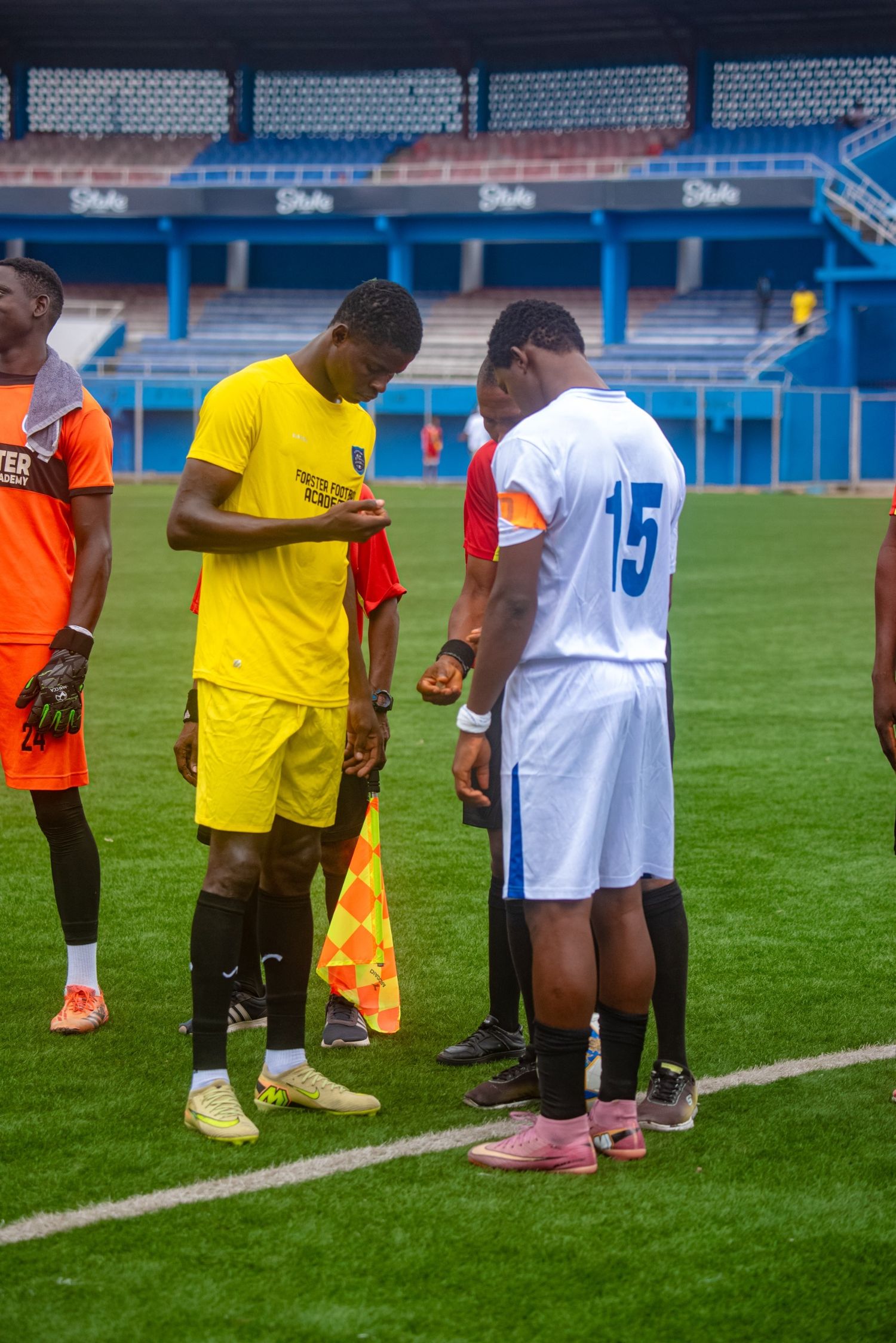 Captains and match officials before kick-off