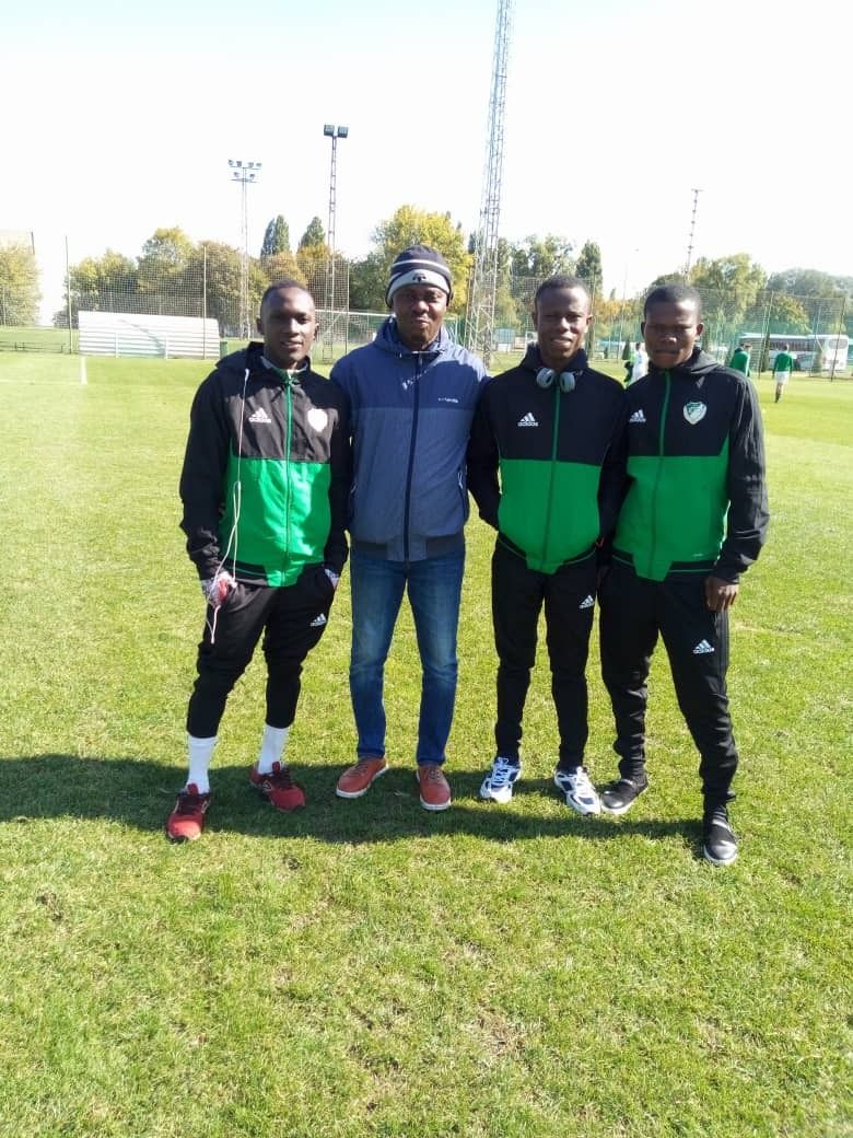 Dreamland products with academy staff at a training ground in Hungary
