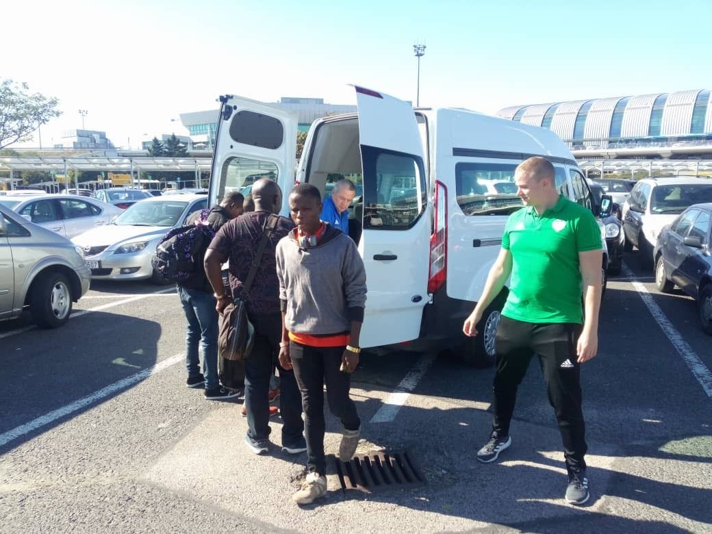 Arrival in Hungary — met by club staff