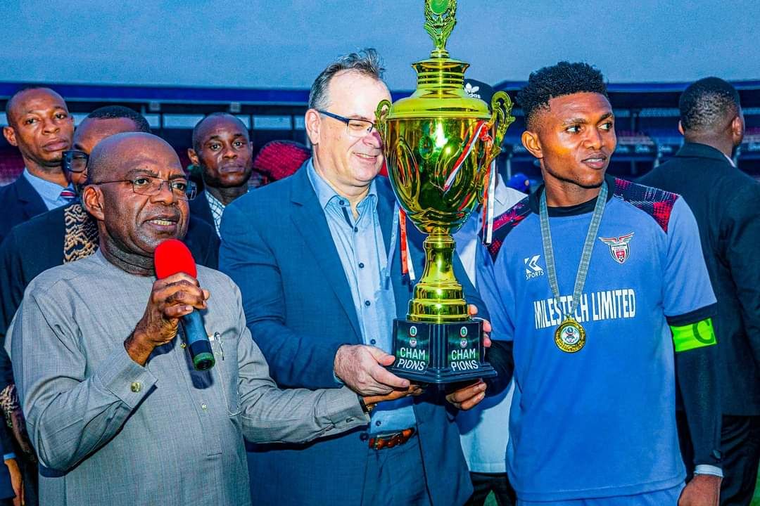 Governor Alex Otti and Ambassador Lorand Endreffy presenting the trophy at Enyimba Stadium